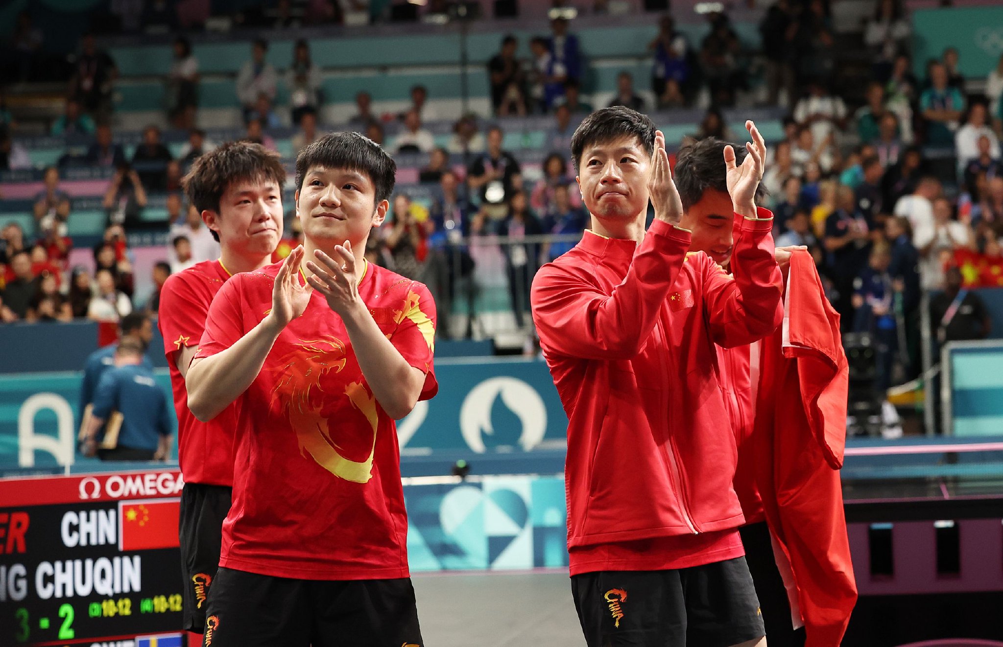 中国乒乓球队力克英国乒乓球队,马龙三分雨点燃全场 中国乒乓球队力克英国乒乓球队,马龙三分雨点燃全场